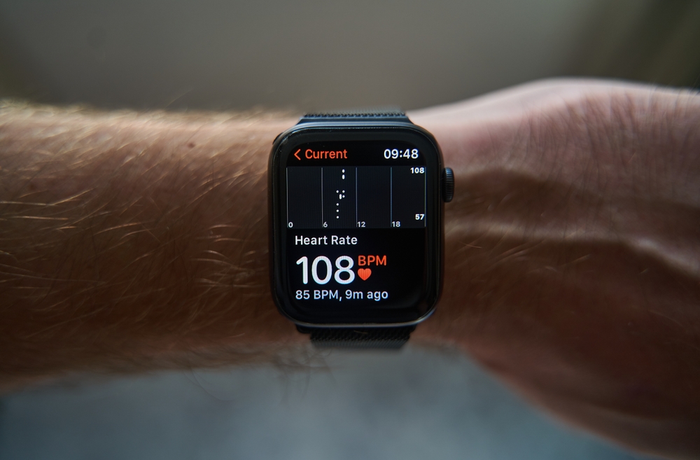 A,Square,Smartwatch,On,A,Man’s,Hand,Close,Up.,Heart
